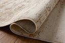 Designed with graphic artistry in gentle dove and warm natural hues, the Nellie NEL-05 Dove / Natural Area Rug is a power-loomed polyester and polypropylene area rug that stands out