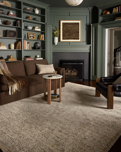 Dressed in cool slate and warm natural hues with vintage and distressed detail, the Newman NEW-01 Slate / Natural Area Rug is a power-loomed polyester area rug that completes any room