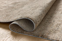 Dressed in cool slate and warm natural hues with vintage and distressed detail, the Newman NEW-01 Slate / Natural Area Rug is a power-loomed polyester area rug that completes any room