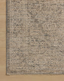 Dressed in cool slate and warm natural hues with vintage and distressed detail, the Newman NEW-01 Slate / Natural Area Rug is a power-loomed polyester area rug that completes any room