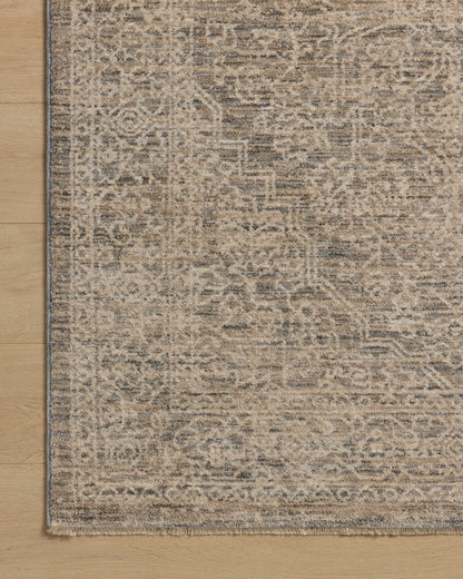 Dressed in cool slate and warm natural hues with vintage and distressed detail, the Newman NEW-01 Slate / Natural Area Rug is a power-loomed polyester area rug that completes any room