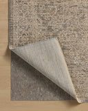 Dressed in cool slate and warm natural hues with vintage and distressed detail, the Newman NEW-01 Slate / Natural Area Rug is a power-loomed polyester area rug that completes any room