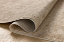 The Newman NEW-01 Taupe / Bone Area Rug transforms any space with versatile taupe and bone tones and vintage and distressed design in a power-loomed polyester area rug