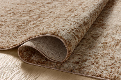 A power-loomed polyester area rug in grounded bark and warm natural tones with vintage and distressed motifs, the Newman NEW-02 Bark / Natural Area Rug grounds your room beautifully