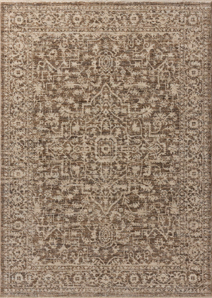 The Newman NEW-02 Dark Taupe / Natural Area Rug is a power-loomed polyester area rug that radiates dark taupe and warm natural charm and vintage and distressed elegance