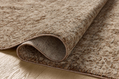 The Newman NEW-02 Dark Taupe / Natural Area Rug is a power-loomed polyester area rug that radiates dark taupe and warm natural charm and vintage and distressed elegance