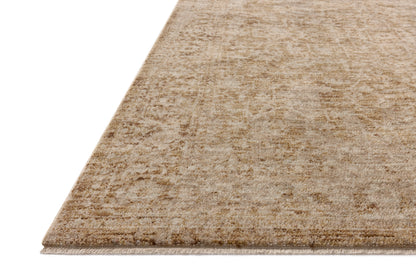 Layered in golden wheat and warm natural hues with vintage and distressed patterns, the Newman NEW-02 Wheat / Natural Area Rug is a power-loomed polyester area rug perfect for any setting
