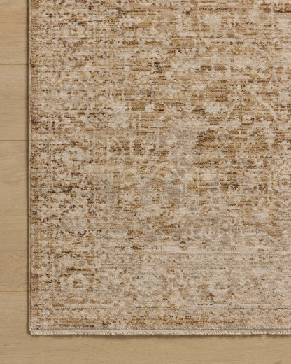 Layered in golden wheat and warm natural hues with vintage and distressed patterns, the Newman NEW-02 Wheat / Natural Area Rug is a power-loomed polyester area rug perfect for any setting