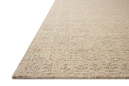 The Novi NVI-01 Fog / Stone Area Rug combines misty and grounding stone tones and traditional patterns in a hand-woven wool area rug for effortless elegance