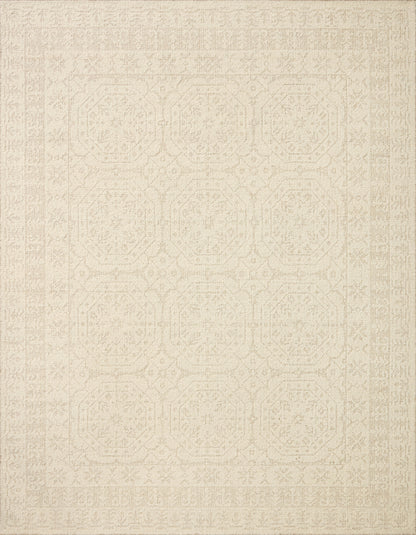 A hand-woven wool area rug featuring traditional design and refined ivory and gentle dove tones, the Novi NVI-01 Ivory / Dove Area Rug adds character to any room