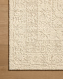 A hand-woven wool area rug featuring traditional design and refined ivory and gentle dove tones, the Novi NVI-01 Ivory / Dove Area Rug adds character to any room