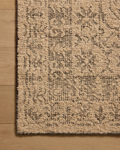 Expertly crafted as a hand-woven wool area rug with traditional artistry, the Novi NVI-01 Tan / Onyx Area Rug captures sandy tan and bold onyx tones beautifully