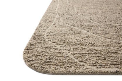 The Otis OTT-01 Oatmeal / Ivory Area Rug pairs cozy oatmeal and refined ivory tones and linear patterns in a hand-tufted wool area rug