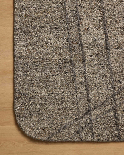 Crafted as a hand-tufted wool area rug, the Otis OTT-02 Stone / Pebble Area Rug brings grounding stone and subtle pebble warmth and linear character to your space