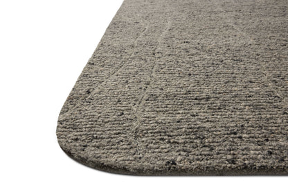 With soft misty and elegant grey hues and linear styling, the Otis OTT-03 Mist / Grey Area Rug is a hand-tufted wool area rug that elevates any room