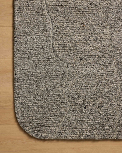 With soft misty and elegant grey hues and linear styling, the Otis OTT-03 Mist / Grey Area Rug is a hand-tufted wool area rug that elevates any room
