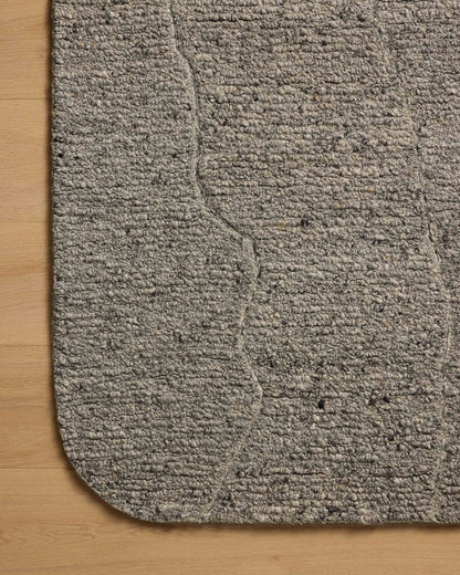 With soft misty and elegant grey hues and linear styling, the Otis OTT-03 Mist / Grey Area Rug is a hand-tufted wool area rug that elevates any room