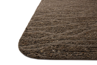 The Otis OTT-04 Bark / Brown Area Rug blends grounded bark and brown tones and linear motifs into a hand-tufted wool area rug with timeless appeal