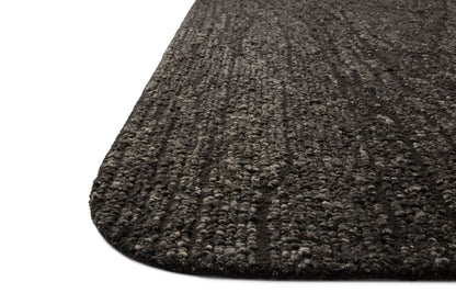 A stunning hand-tufted wool area rug with linear detail, the Otis OTT-05 Charcoal / Granite Area Rug features deep charcoal and striking granite tones for a polished look