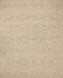 The Penny PEN-01 Gold / Natural Area Rug is a hand-tufted wool area rug that radiates radiant gold and warm natural charm and ribbed and high-low textured elegance