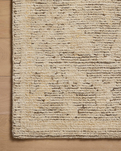 Layered in coffee and warm natural hues with ribbed and high-low textured patterns, the Penny PEN-02 Coffee / Natural Area Rug is a hand-tufted wool area rug perfect for any setting