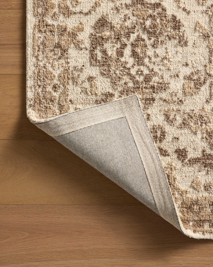 A power-loomed polyester area rug with traditional design in refined ivory and warm natural hues, the Percival PCV-01 Ivory / Natural Area Rug is a standout in any décor