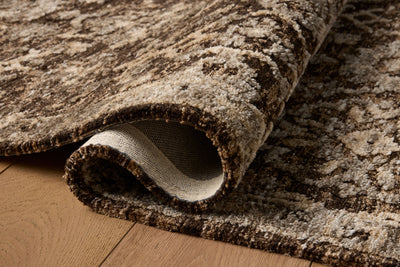 The Percival PCV-02 Bark / Pebble Area Rug highlights grounded bark and subtle pebble tones and traditional texture in a beautifully made power-loomed polyester area rug