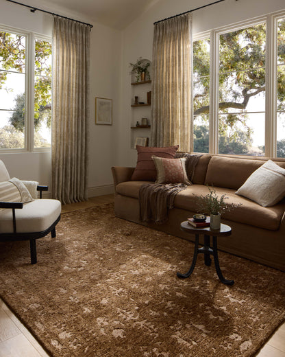 The Percival PCV-03 Mocha / Sand Area Rug transforms any space with luxurious mocha and sandy tones and traditional design in a power-loomed polyester area rug