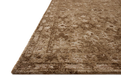 The Percival PCV-03 Mocha / Sand Area Rug transforms any space with luxurious mocha and sandy tones and traditional design in a power-loomed polyester area rug