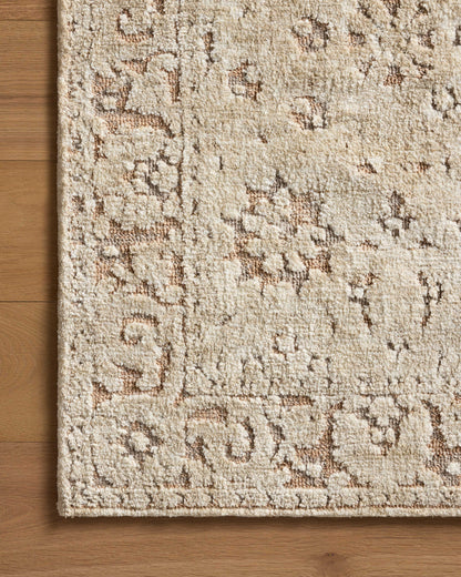 A power-loomed polyester area rug in warm natural and salmon tones with traditional motifs, the Percival PCV-04 Natural / Salmon Area Rug grounds your room beautifully