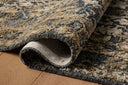 The Percival PCV-05 Denim /Granite Area Rug is a power-loomed polyester area rug that radiates casual denim and striking granite charm and traditional elegance