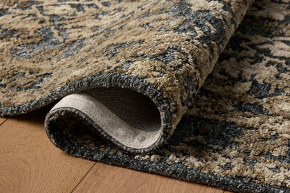 The Percival PCV-05 Denim /Granite Area Rug is a power-loomed polyester area rug that radiates casual denim and striking granite charm and traditional elegance