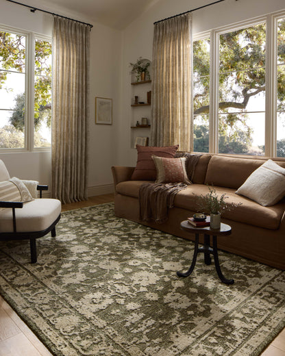 The Percival PCV-06 Moss / Natural Area Rug brings lush moss and warm natural character and traditional flair to your home in a power-loomed polyester area rug