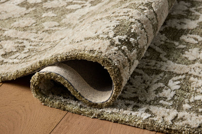 The Percival PCV-06 Moss / Natural Area Rug brings lush moss and warm natural character and traditional flair to your home in a power-loomed polyester area rug