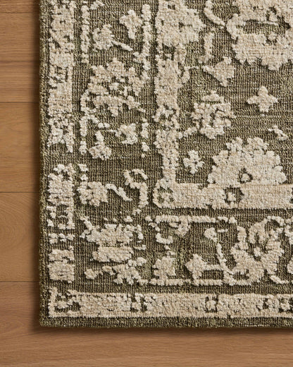 The Percival PCV-06 Moss / Natural Area Rug brings lush moss and warm natural character and traditional flair to your home in a power-loomed polyester area rug