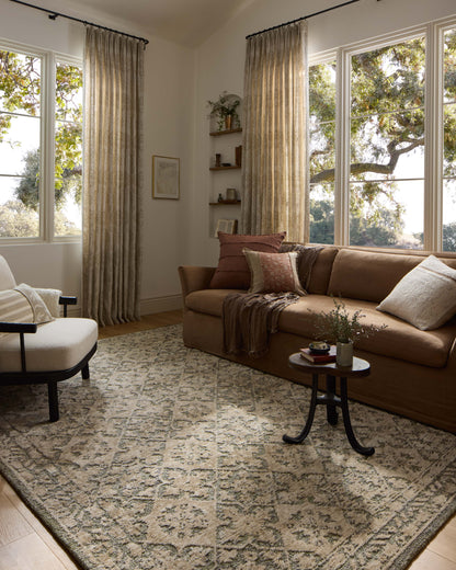 Finished in calming sage and grounding stone tones with traditional styling, the Percival PCV-07 Sage / Stone Area Rug is a power-loomed polyester area rug for modern living
