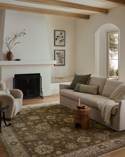 Layered in grounded bark and refined ivory hues with vintage patterns, the Priscilla PRL-01 Bark / Ivory Area Rug is a power-loomed 100% polyester area rug perfect for any setting