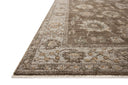 Layered in grounded bark and refined ivory hues with vintage patterns, the Priscilla PRL-01 Bark / Ivory Area Rug is a power-loomed 100% polyester area rug perfect for any setting