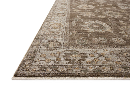 Layered in grounded bark and refined ivory hues with vintage patterns, the Priscilla PRL-01 Bark / Ivory Area Rug is a power-loomed 100% polyester area rug perfect for any setting