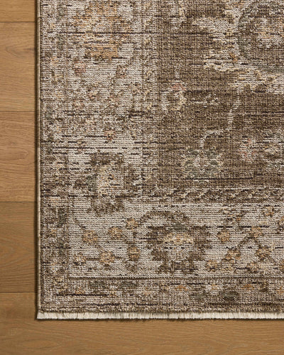 Layered in grounded bark and refined ivory hues with vintage patterns, the Priscilla PRL-01 Bark / Ivory Area Rug is a power-loomed 100% polyester area rug perfect for any setting