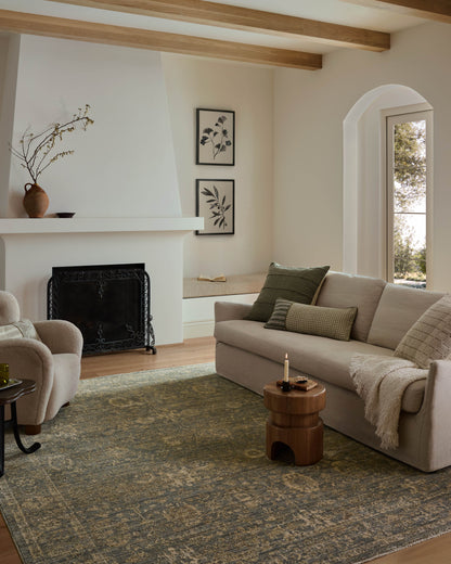 Featuring calming blue and sandy hues and vintage detail, the Priscilla PRL-03 Blue / Sand Area Rug is a power-loomed 100% polyester area rug for any room