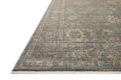 Featuring calming blue and sandy hues and vintage detail, the Priscilla PRL-03 Blue / Sand Area Rug is a power-loomed 100% polyester area rug for any room