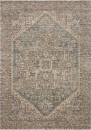 A power-loomed 100% polyester area rug with vintage flair in calming blue and grounded bark tones, the Priscilla PRL-04 Blue / Bark Area Rug anchors any room