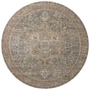 A power-loomed 100% polyester area rug with vintage flair in calming blue and grounded bark tones, the Priscilla PRL-04 Blue / Bark Area Rug anchors any room