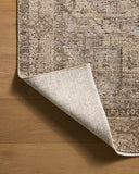 With warm beige and earthy hues and vintage styling, the Priscilla PRL-07 Beige / Earth Area Rug is a power-loomed 100% polyester area rug that elevates any room