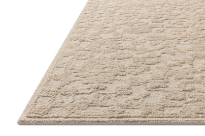 Featuring soft cream and refined ivory hues and floral detail, the Prudence PRU-01 Cream / Ivory Area Rug is a hand-tufted wool and cotton area rug for any room