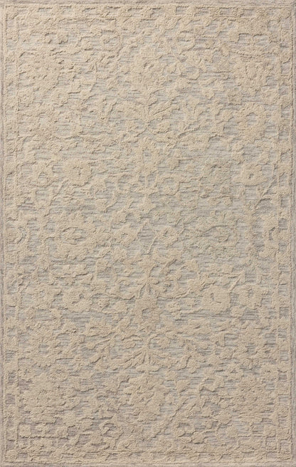 A hand-tufted wool and cotton area rug with floral flair in soft misty and refined ivory tones, the Prudence PRU-01 Mist / Ivory Area Rug anchors any room