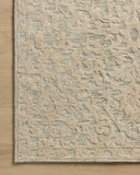 The Prudence PRU-01 Sage / Ivory Area Rug pairs calming sage and refined ivory tones and floral patterns in a hand-tufted wool and cotton area rug