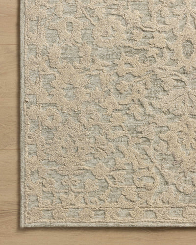 The Prudence PRU-01 Sage / Ivory Area Rug pairs calming sage and refined ivory tones and floral patterns in a hand-tufted wool and cotton area rug