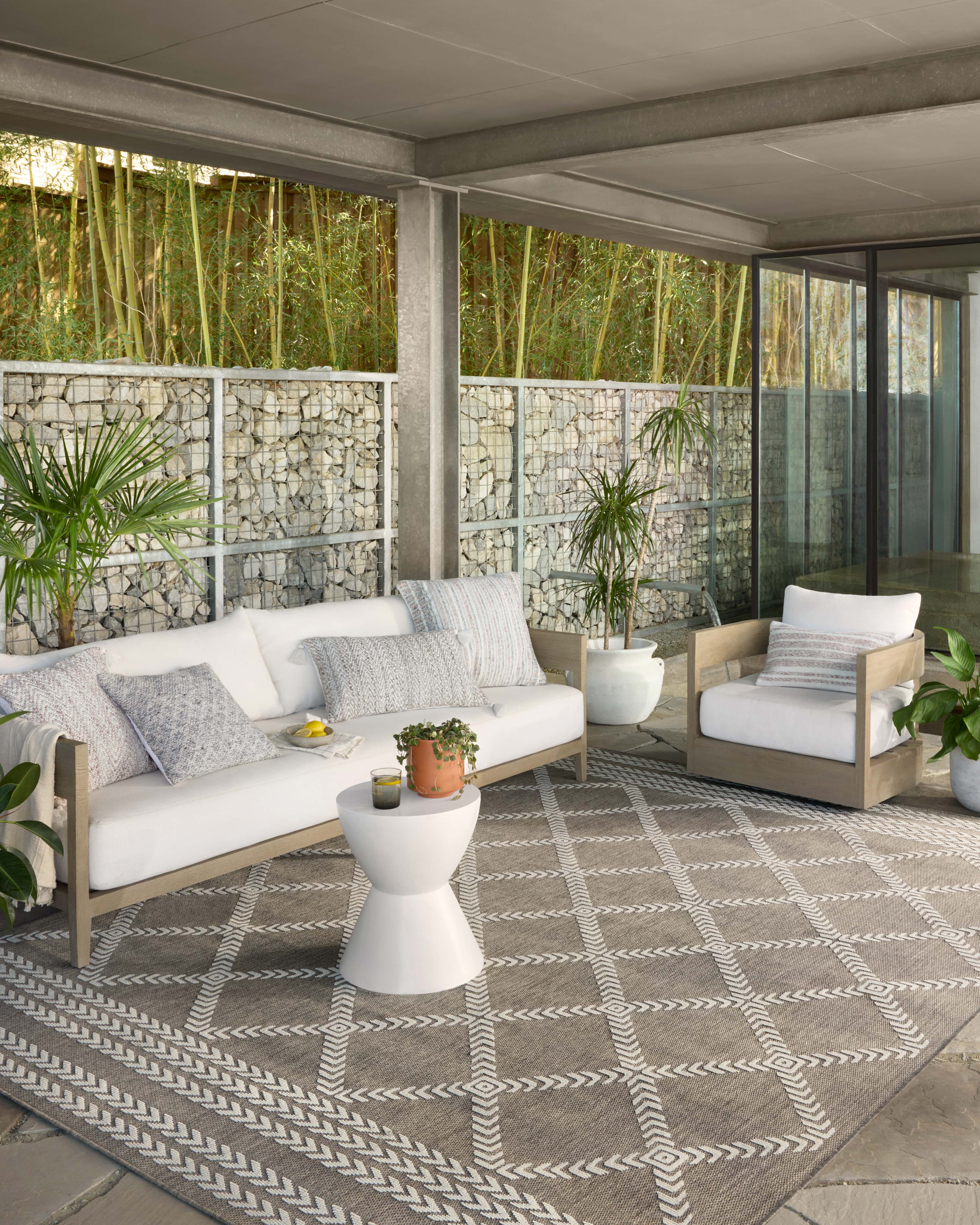  Rainier RAI-05 Natural and ivory modern indoor outdoor area rug, calming colors, weather-resistant polypropylene.
